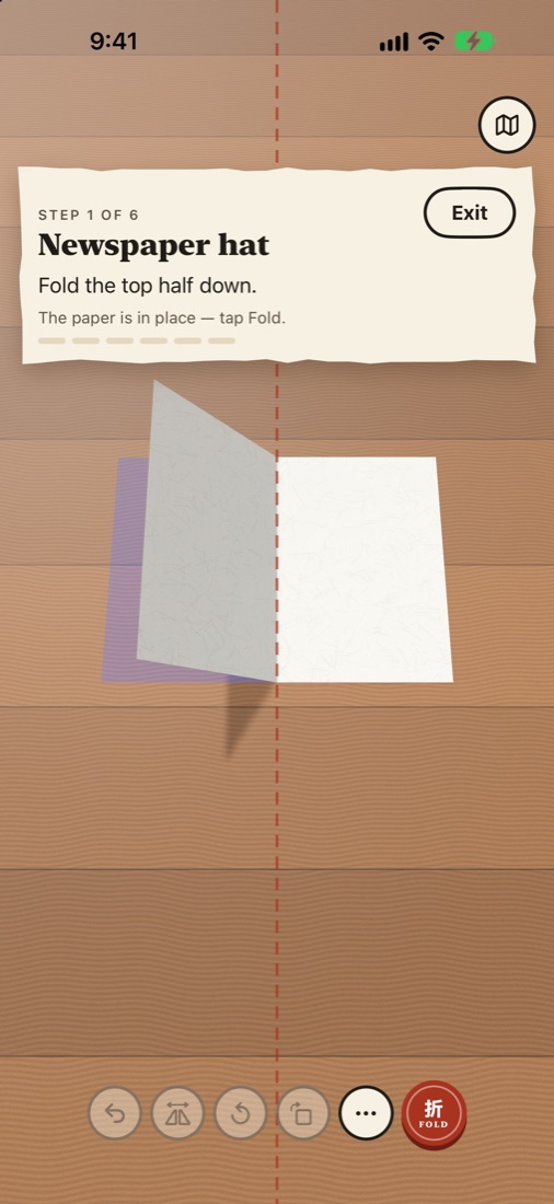 A guided newspaper-hat model, step one